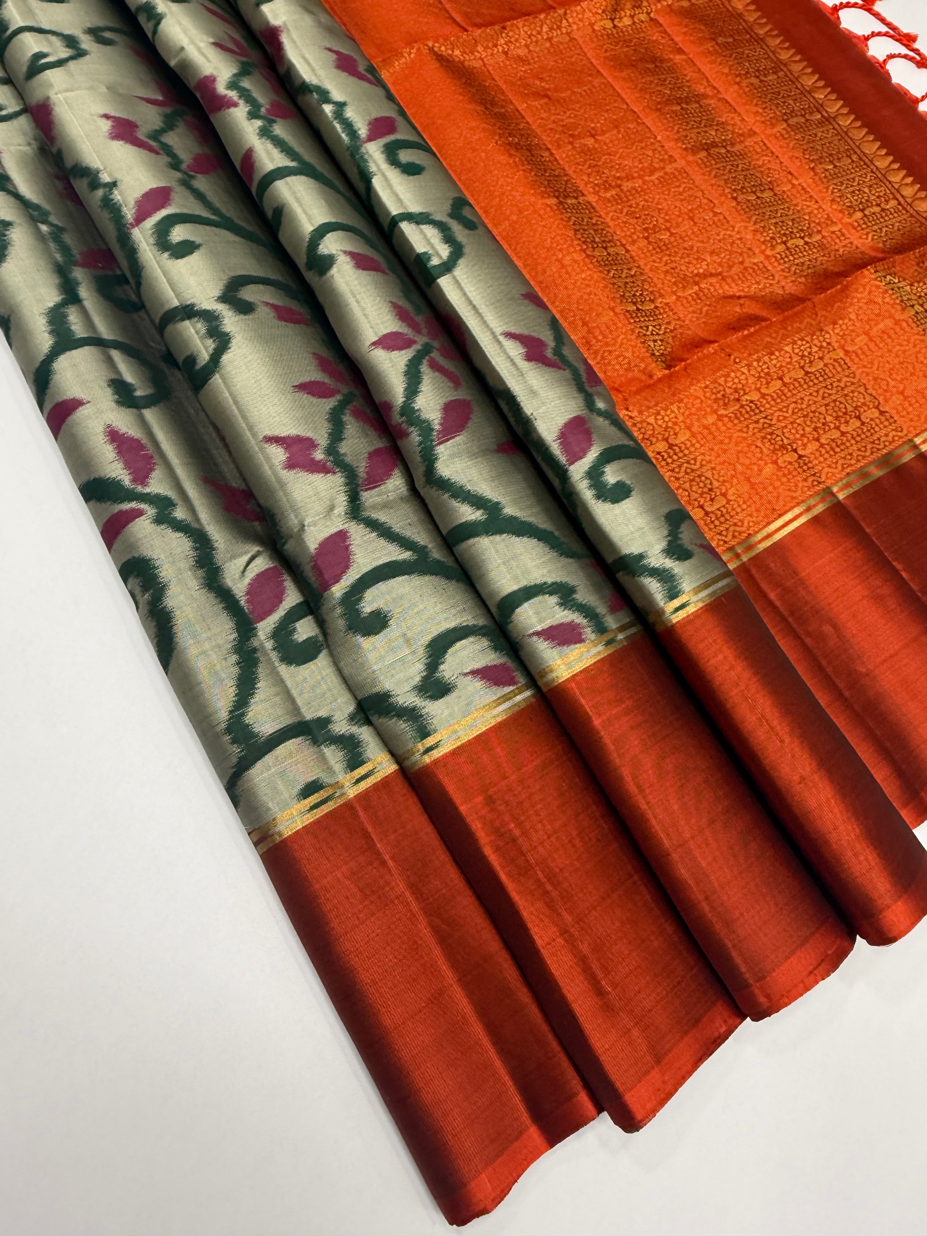 VSM399 -pastel green color body , orange color pallu , blouse
