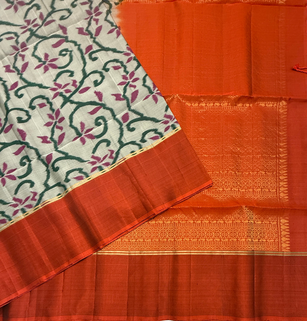 VSM399 -pastel green color body , orange color pallu , blouse