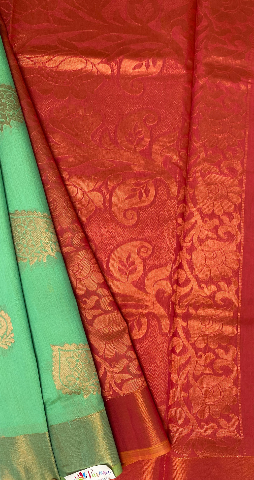 VSKC322 - rexona green color body , pinkish orange color pallu , blouse.