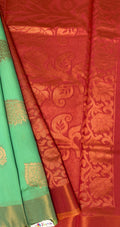 VSKC322 - rexona green color body , pinkish orange color pallu , blouse.