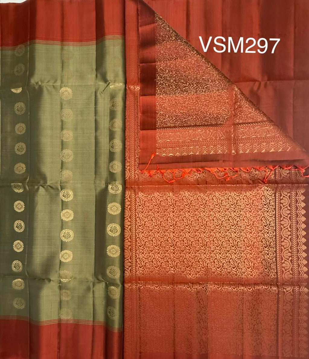 VSM297 - khaki color body , orange with black color pallu , blouse&nbsp;