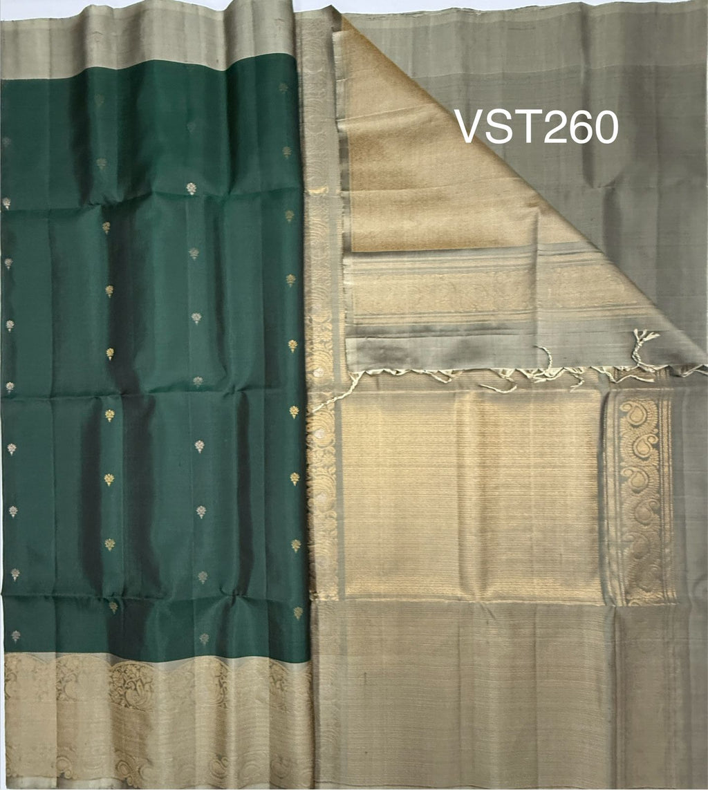 VST260 - green color body , pastel grey color pallu , blouse - Pure silk saree