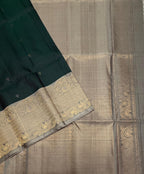 VST260 - green color body , pastel grey color pallu , blouse - Pure silk saree