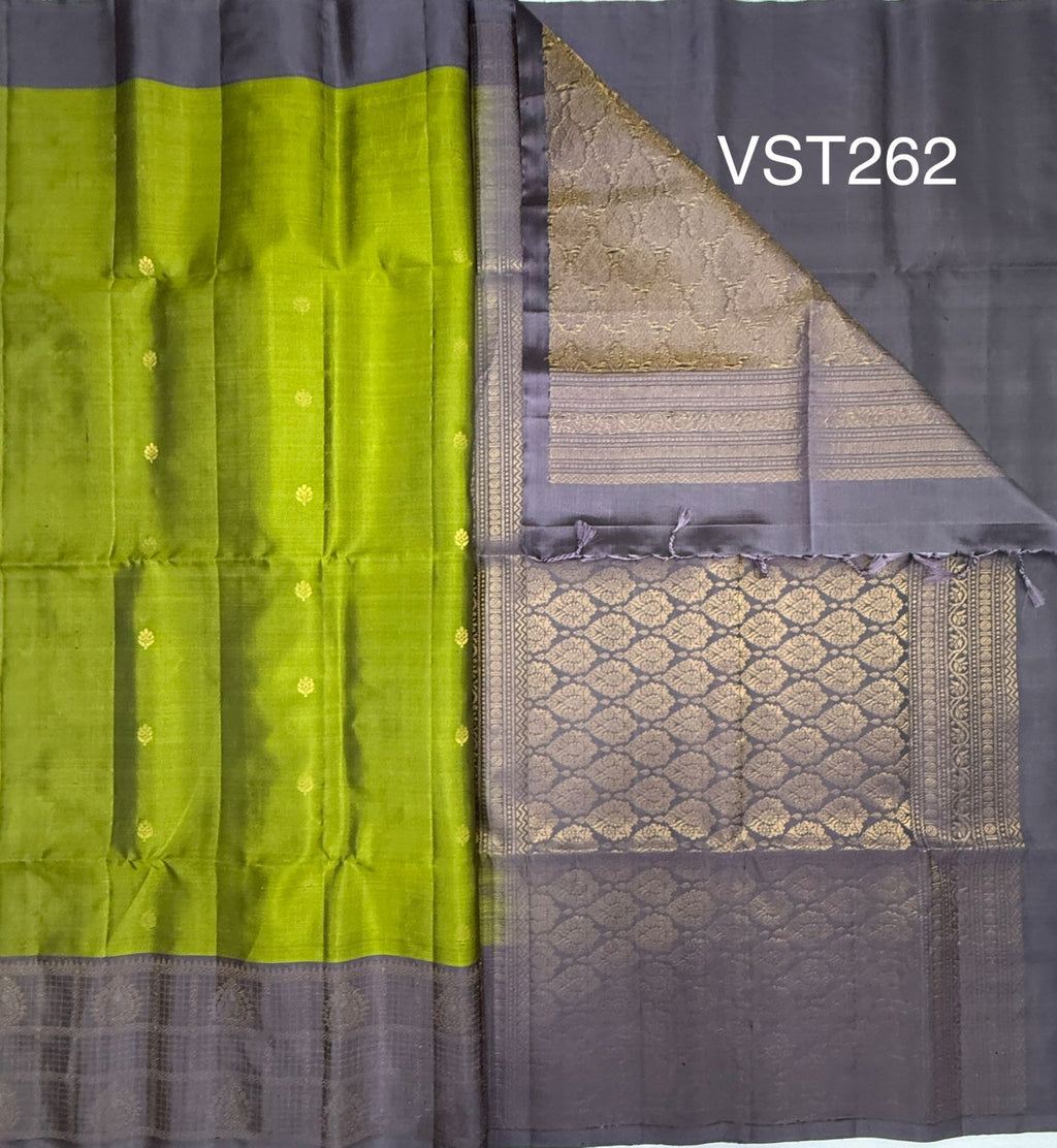 VST262 - mehandi green color body , lavender color pallu , blouse - Pure silk saree