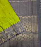 VST262 - mehandi green color body , lavender color pallu , blouse - Pure silk saree