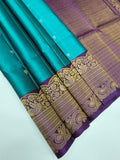 VST265 - peacock green color body , violet color pallu , blouse - Pure silk saree