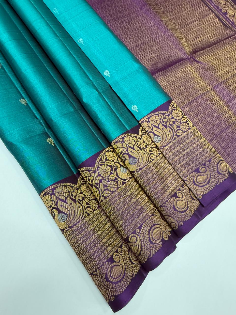 VST265 - peacock green color body , violet color pallu , blouse - Pure silk saree