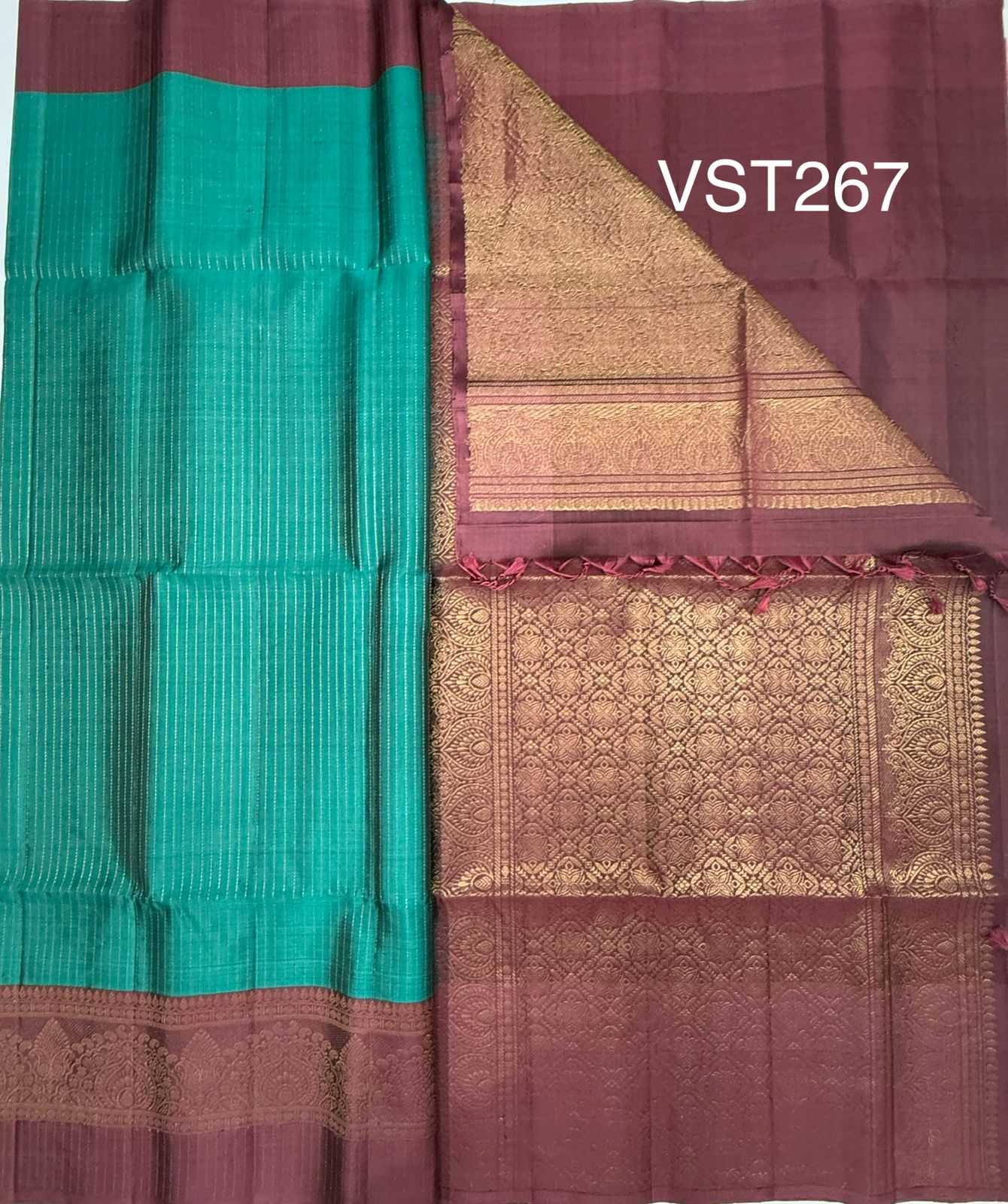 VST267 - peacock green color body , dusky pink color pallu , blouse - Pure silk saree