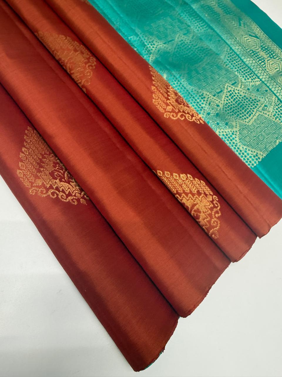 VSBL409 - rust orange color body , sea blue color pallu , blouse - Pure silk saree