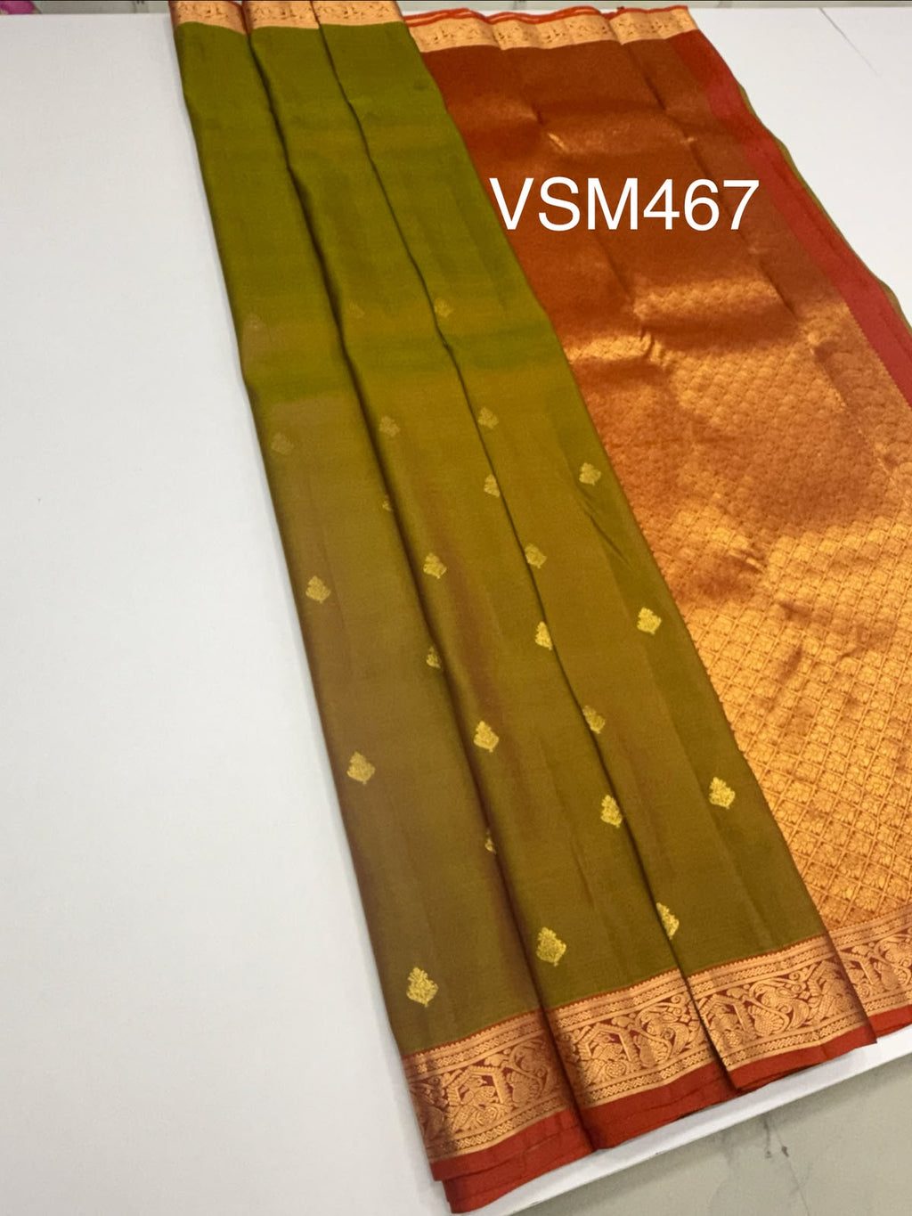 VSM467 - dual green color body, rust orange color pallu , blouse.
