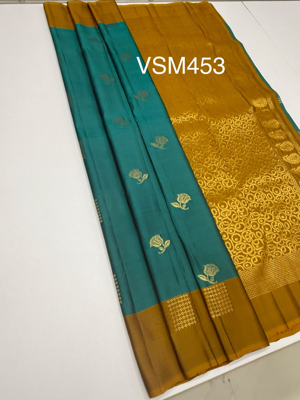 VSM453 - teal blue color body, honey brown color pallu , blouse.