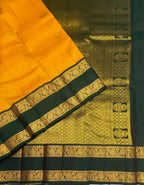 VSM441 - mustard yellow color body , bottle green color pallu , blouse.