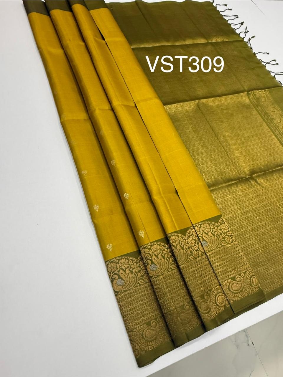 VST309 - yellow with green color body , cowdung green color pallu,blouse - Pure silk saree