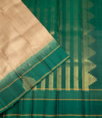 VSF1147 - cream color body , green color pallu,blouse - Pure silk saree