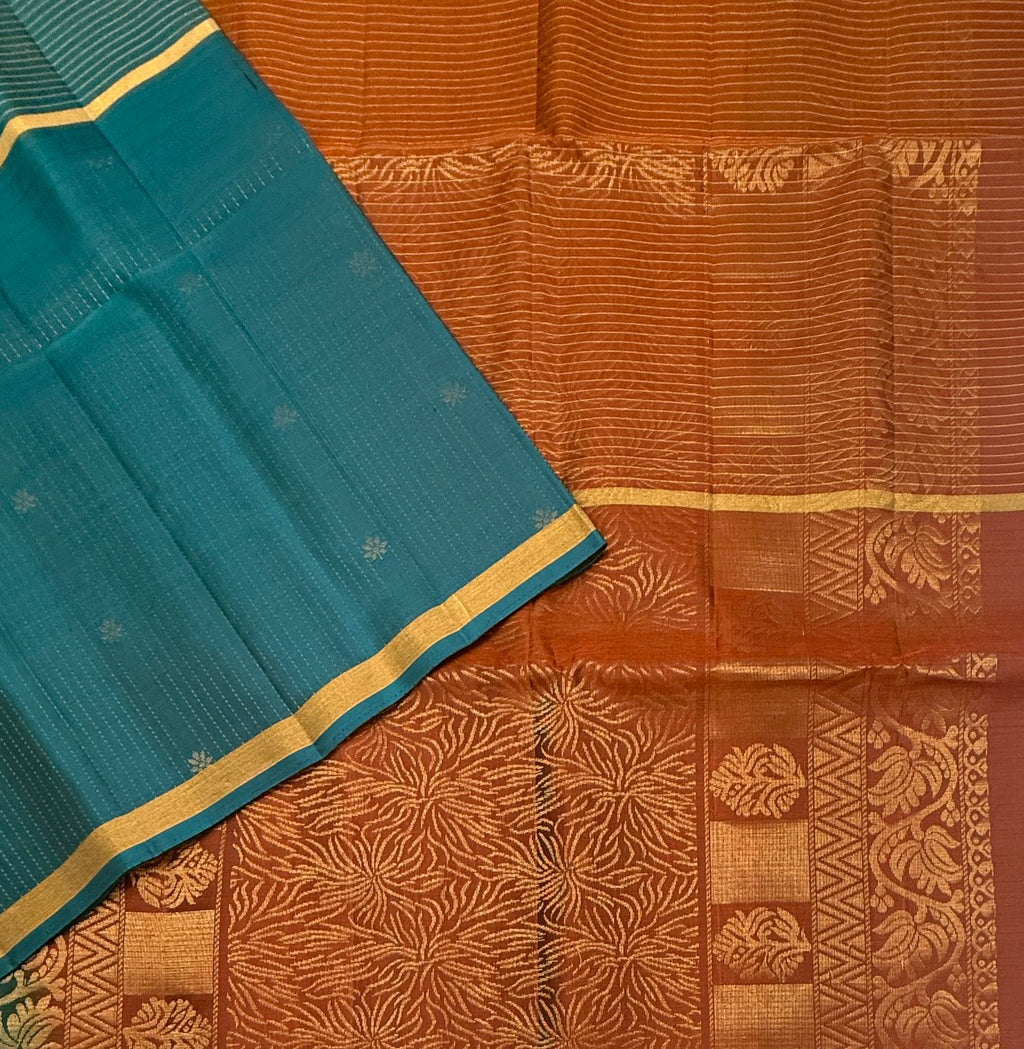 VSF1233 - peacock green color body , rust orange color pallu,blouse - Pure silk saree