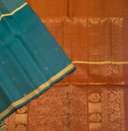 VSF1233 - peacock green color body , rust orange color pallu,blouse - Pure silk saree