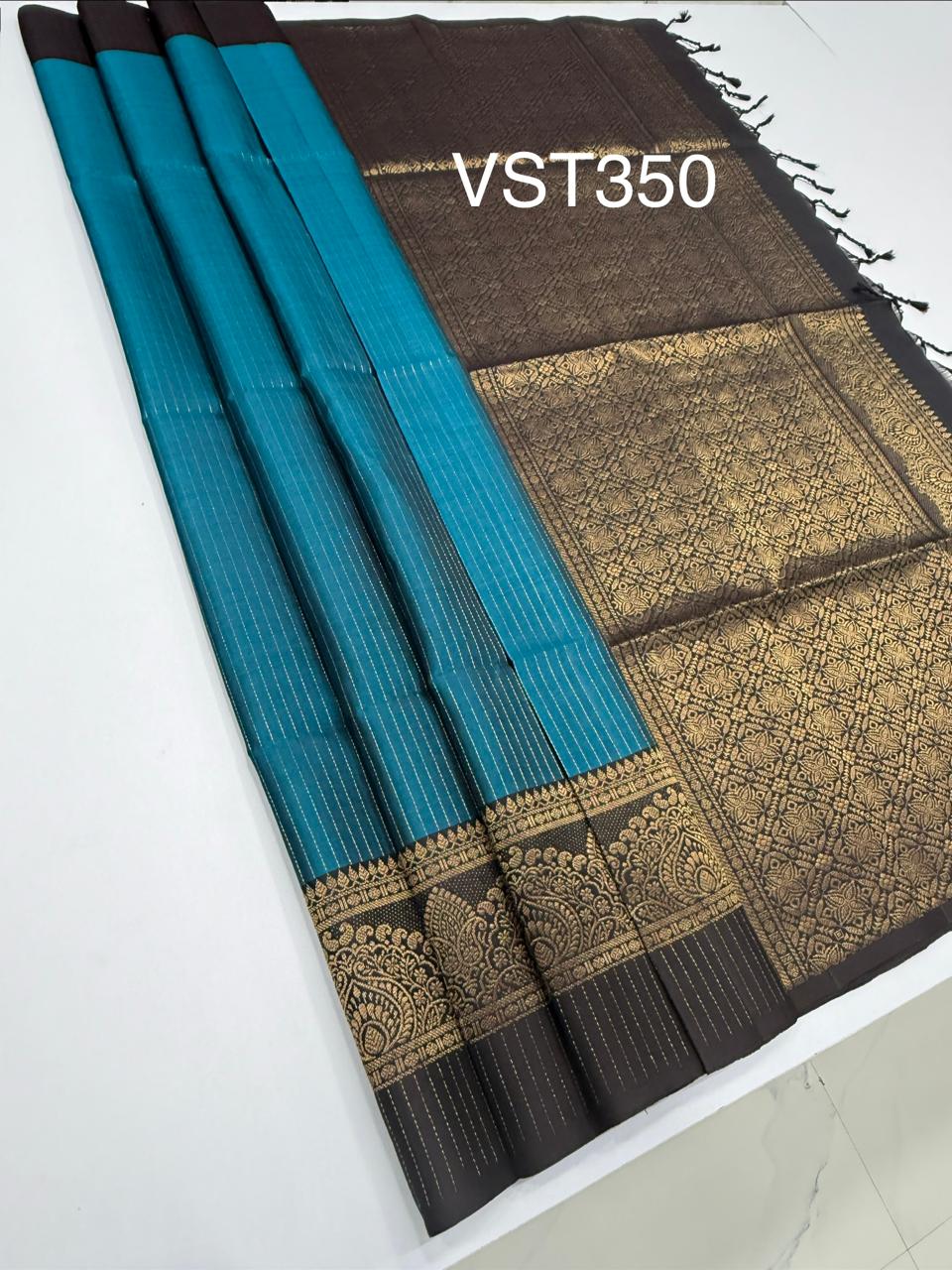 VST350 - peacock green color body , dark purple color pallu , blouse - Pure silk saree