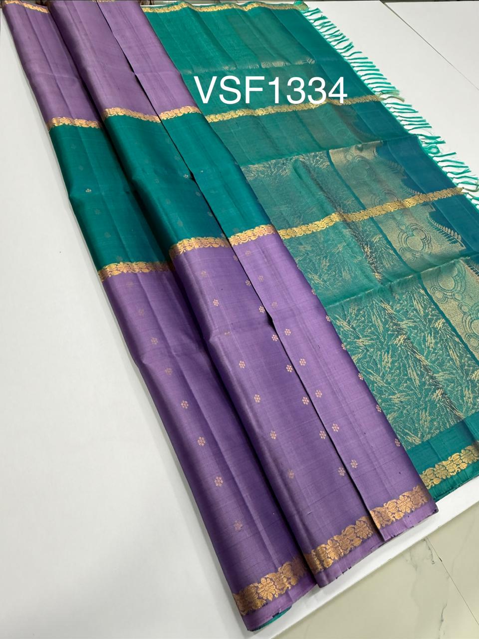 VSF1334 - light lavender color body , peacock green color pallu,blouse - Pure silk saree