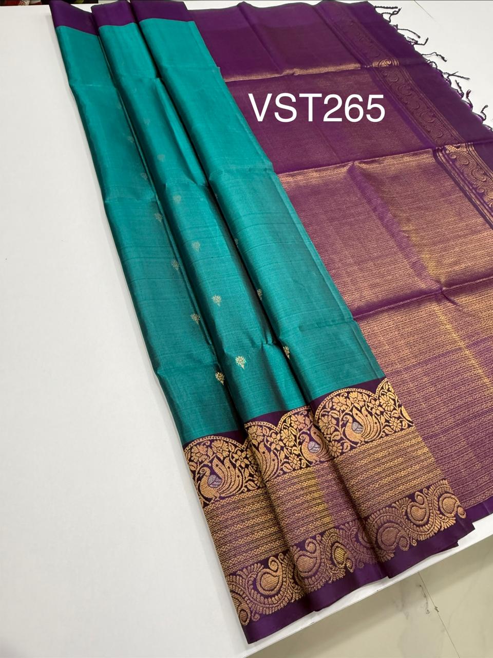 VST265 - peacock green color body , violet color pallu , blouse - Pure silk saree