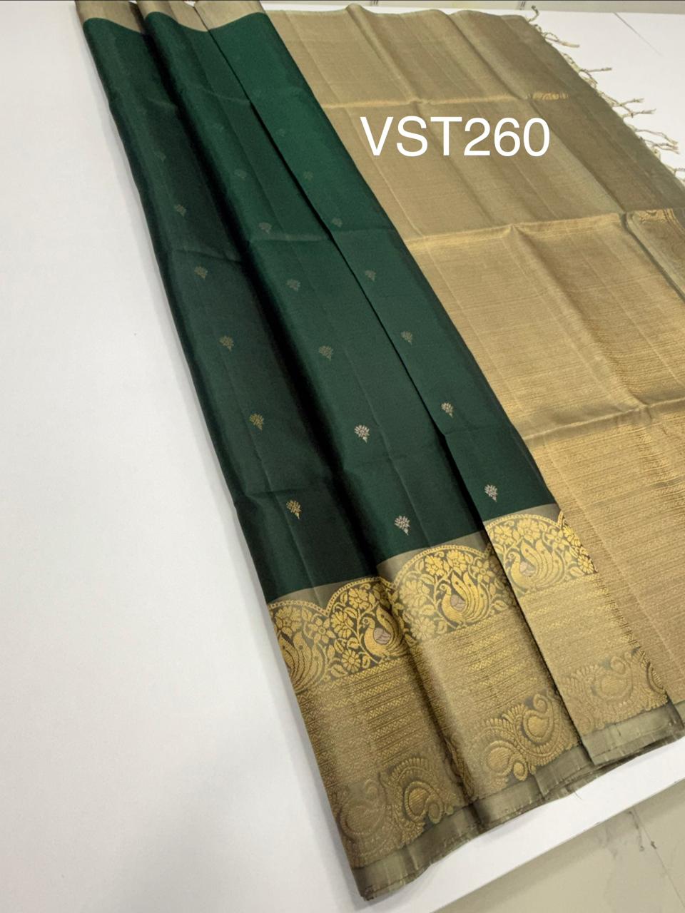 VST260 - green color body , pastel grey color pallu , blouse - Pure silk saree