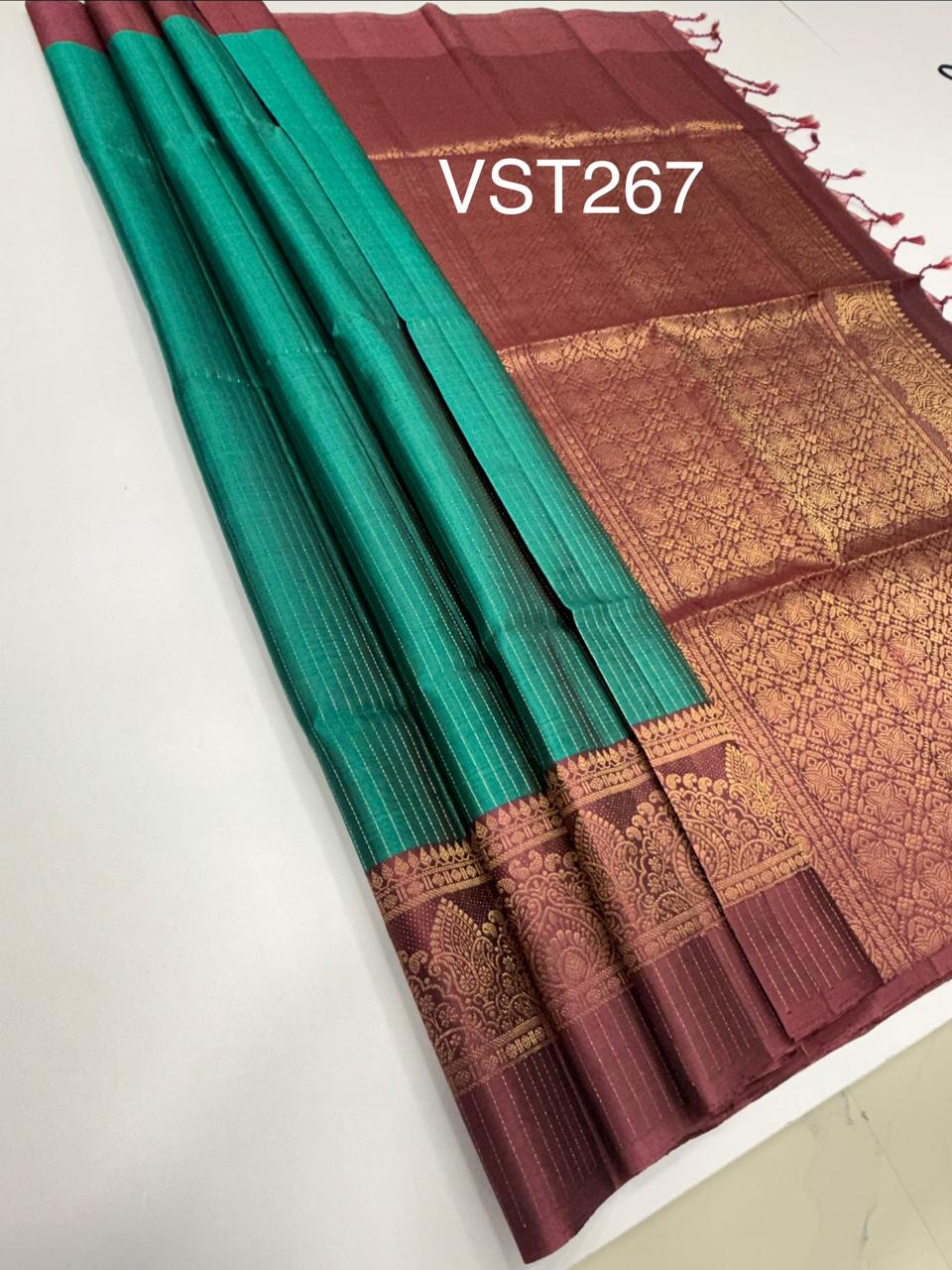 VST267 - peacock green color body , dusky pink color pallu , blouse - Pure silk saree